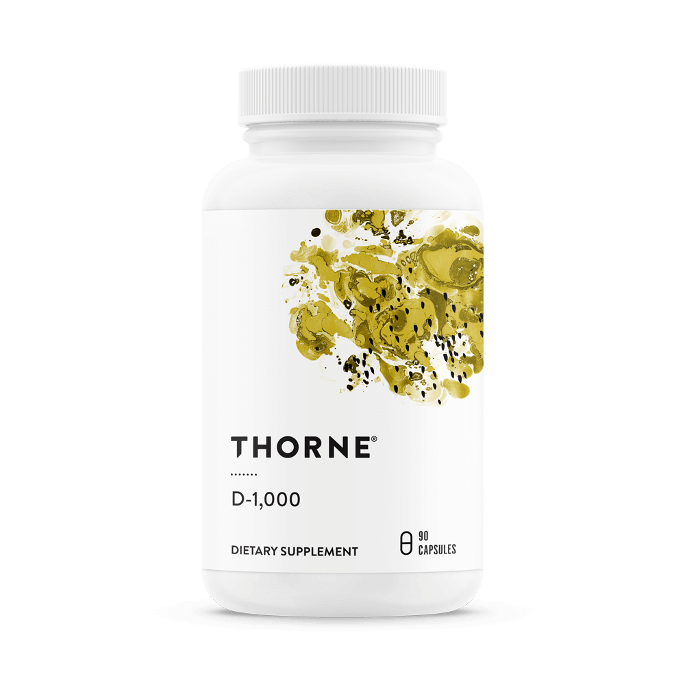 Thorne D-1000 Vitamin D supplement bottle front, white with yellow abstract design and label showing 90 capsules
