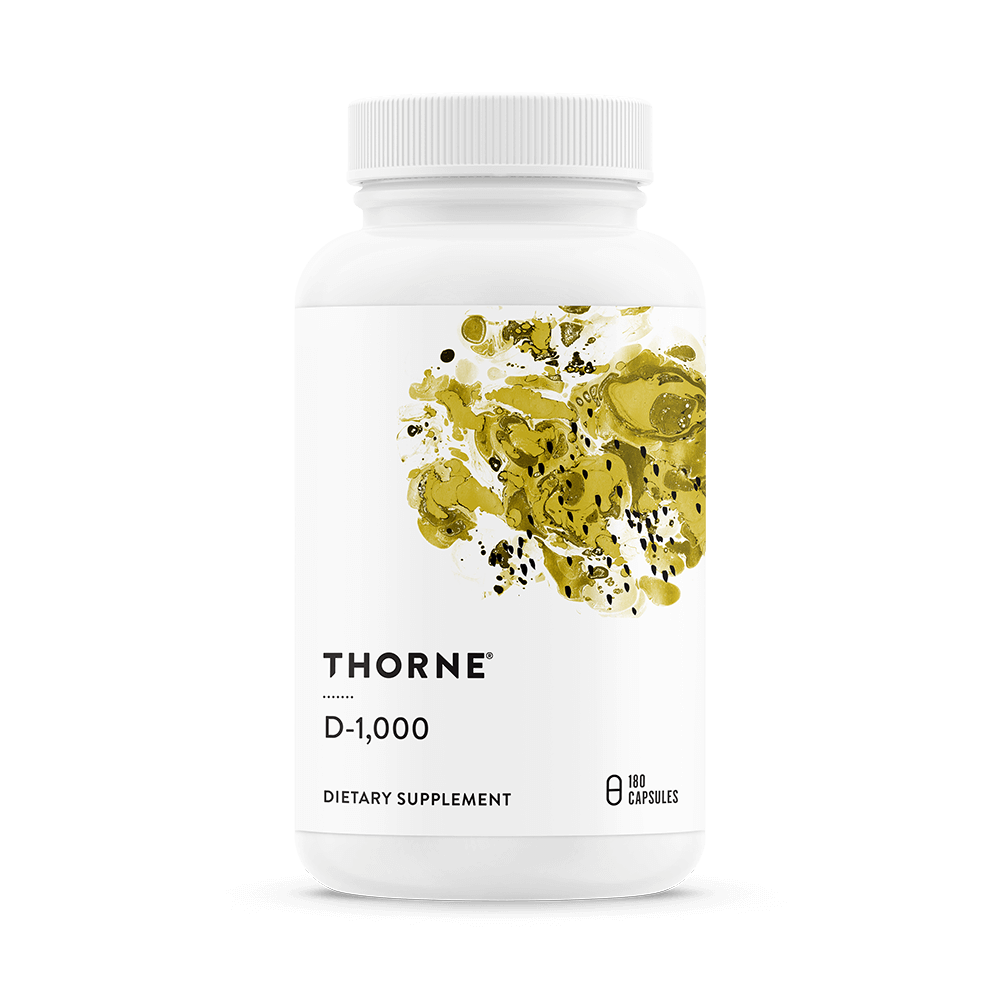 Thorne Vitamin D-1,000 supplement bottle front, white with yellow abstract design, 180 capsules indicated on label.