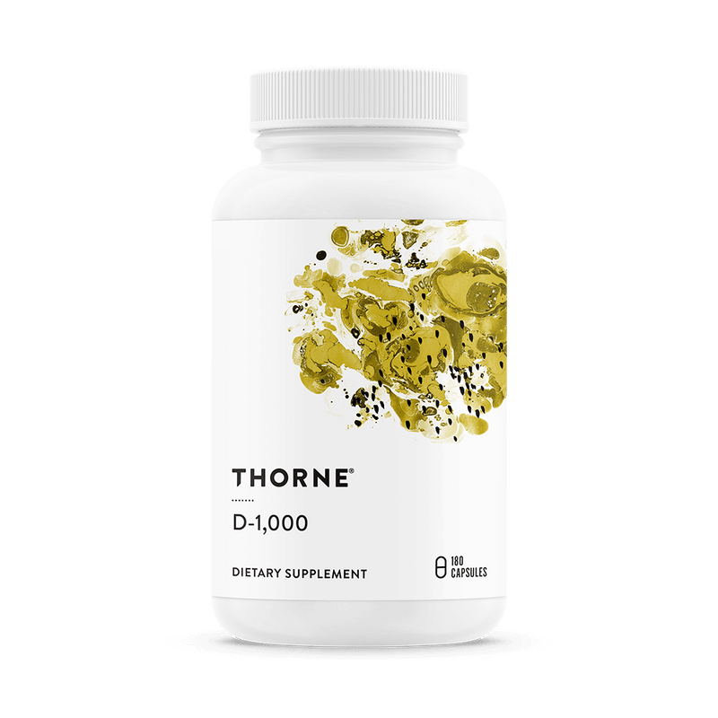 Thorne Vitamin D-1,000 supplement bottle front, white with yellow abstract design, 180 capsules indicated on label.