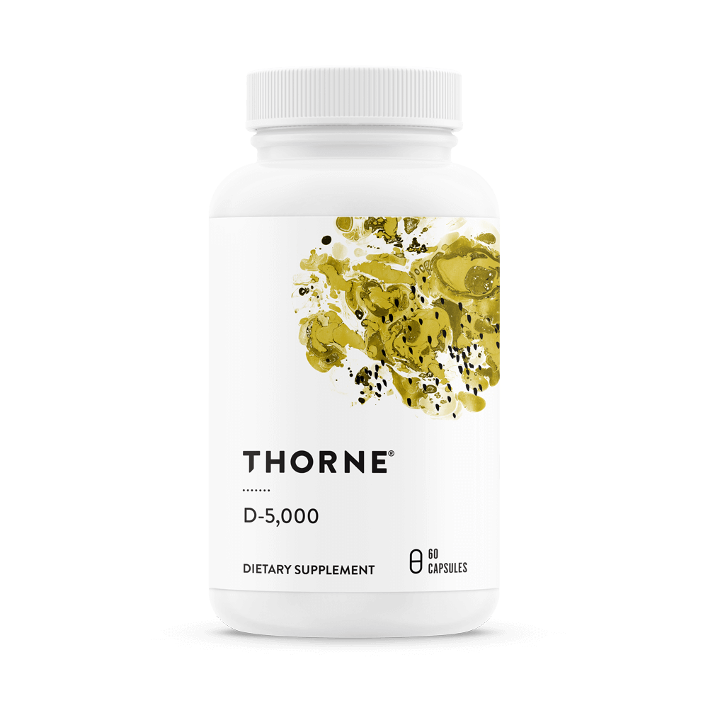 Thorne D-5,000 Vitamin D 60 capsules bottle front with white label and gold abstract design