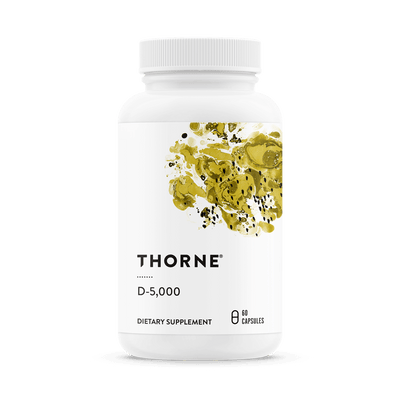 Thorne D-5,000 Vitamin D 60 capsules bottle front with white label and gold abstract design
