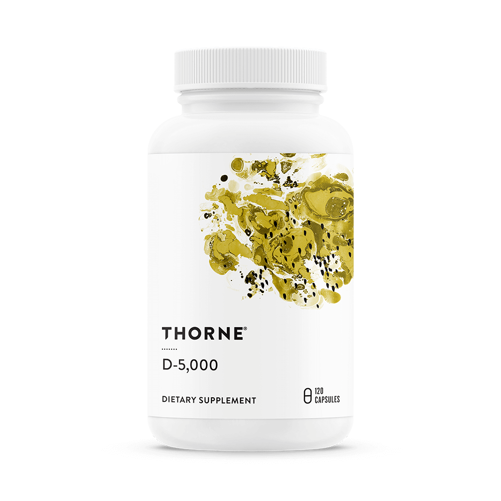 Thorne D-5,000 Vitamin D dietary supplement bottle front, white with yellow abstract design, 120 servings capsules.
