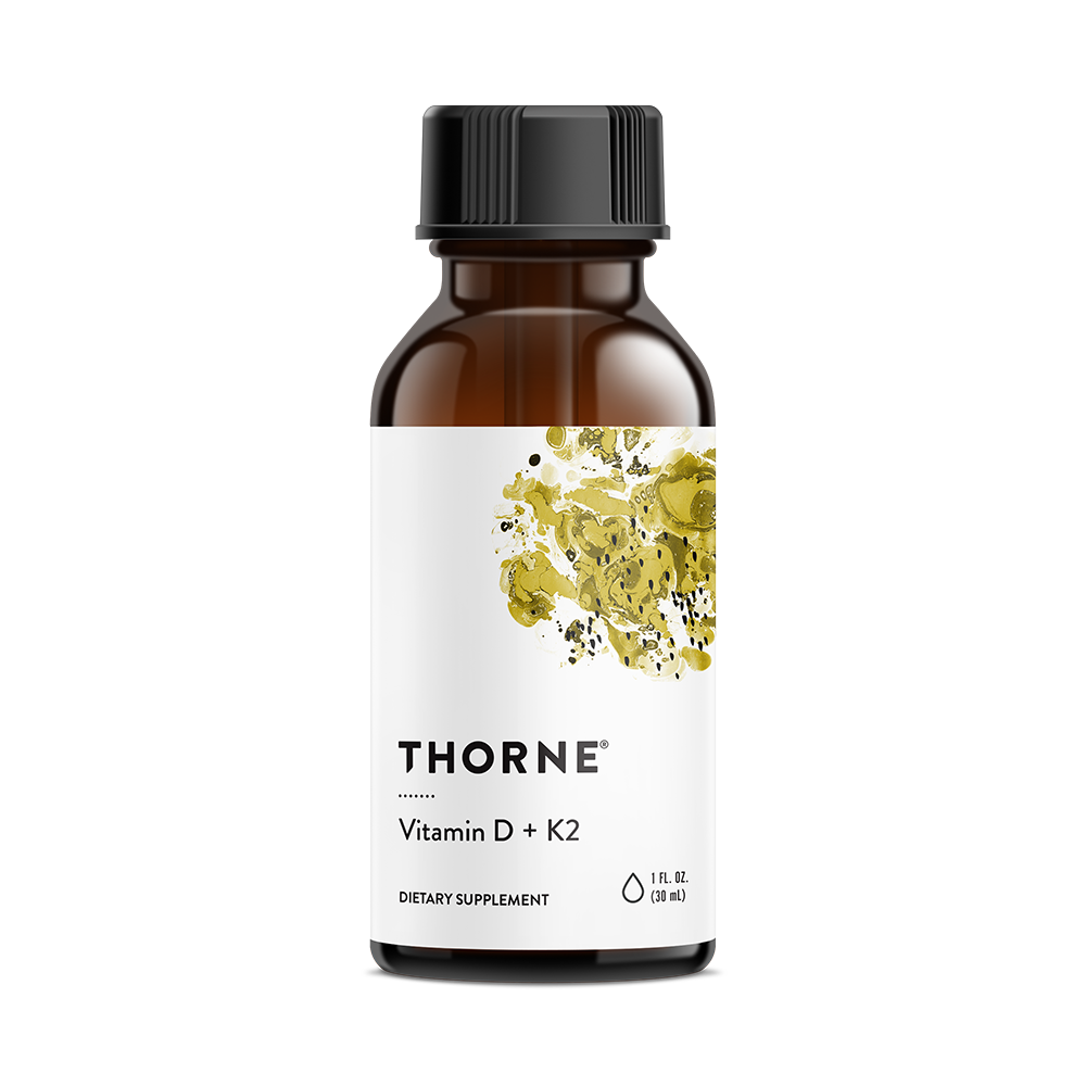 Thorne Vitamin D K2 Liquid 1200 Drops in an amber bottle with white label and yellow abstract design, front view
