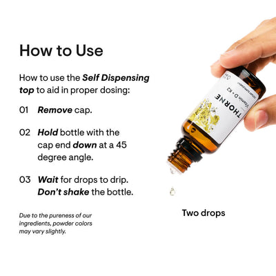 Thorne Vitamin D K2 Liquid bottle tilted to dispense two drops, with step-by-step dosing instructions on a white background.