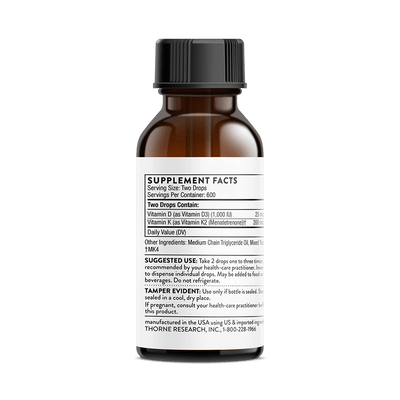Thorne Vitamin D K2 Liquid 1200 Drops bottle back showing supplement facts and usage label on amber glass packaging